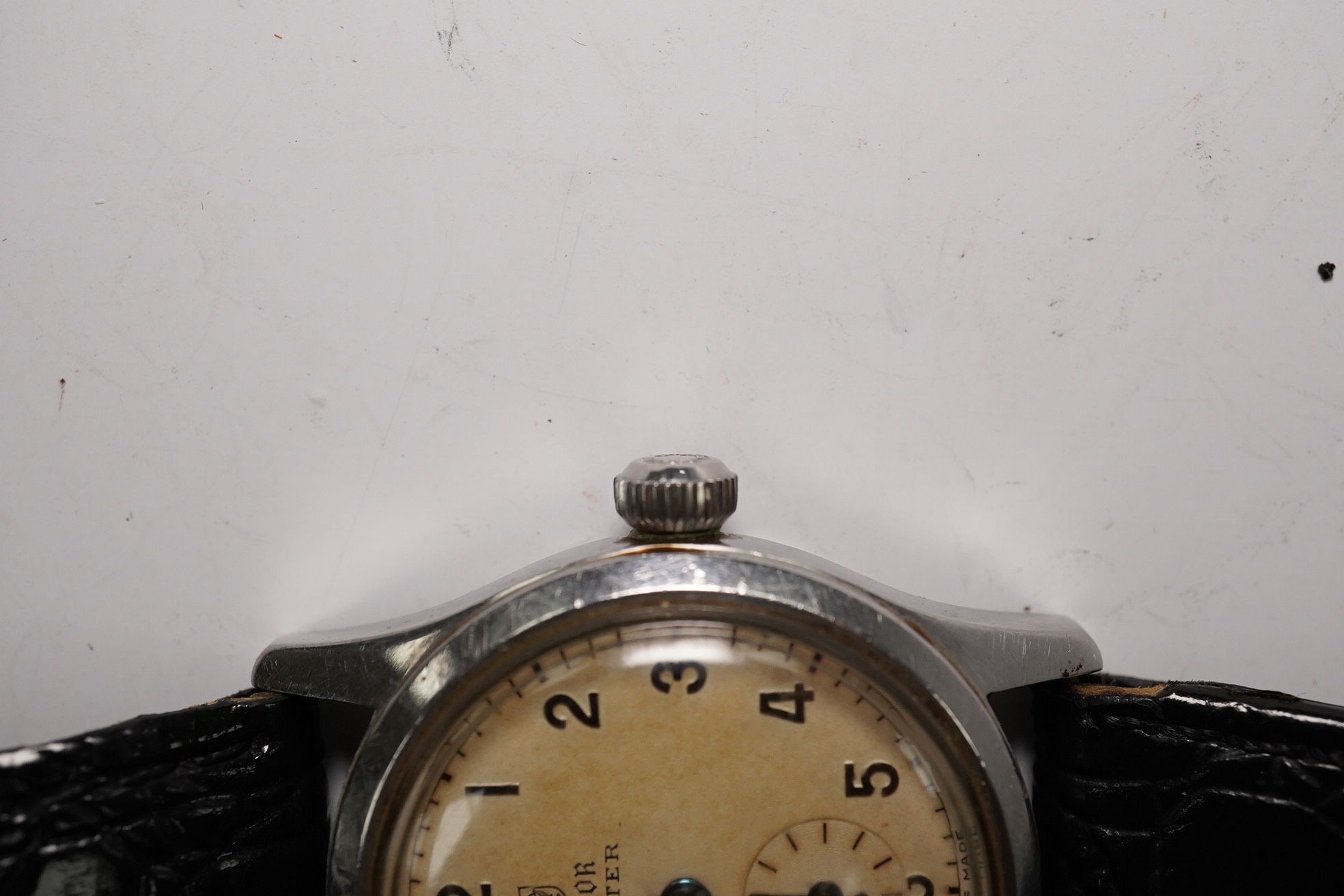 A stainless steel Tudor Oyster manual wind wrist watch, on an associated strap, case diameter 31mm. Condition - poor to fair